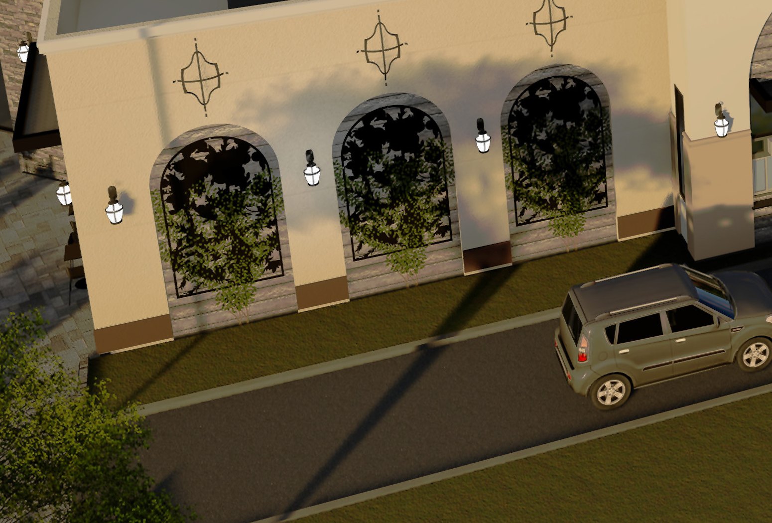 Retail pad with three tall arched openings, warm cream stucco and a landscaped drive-thru lane at golden hour