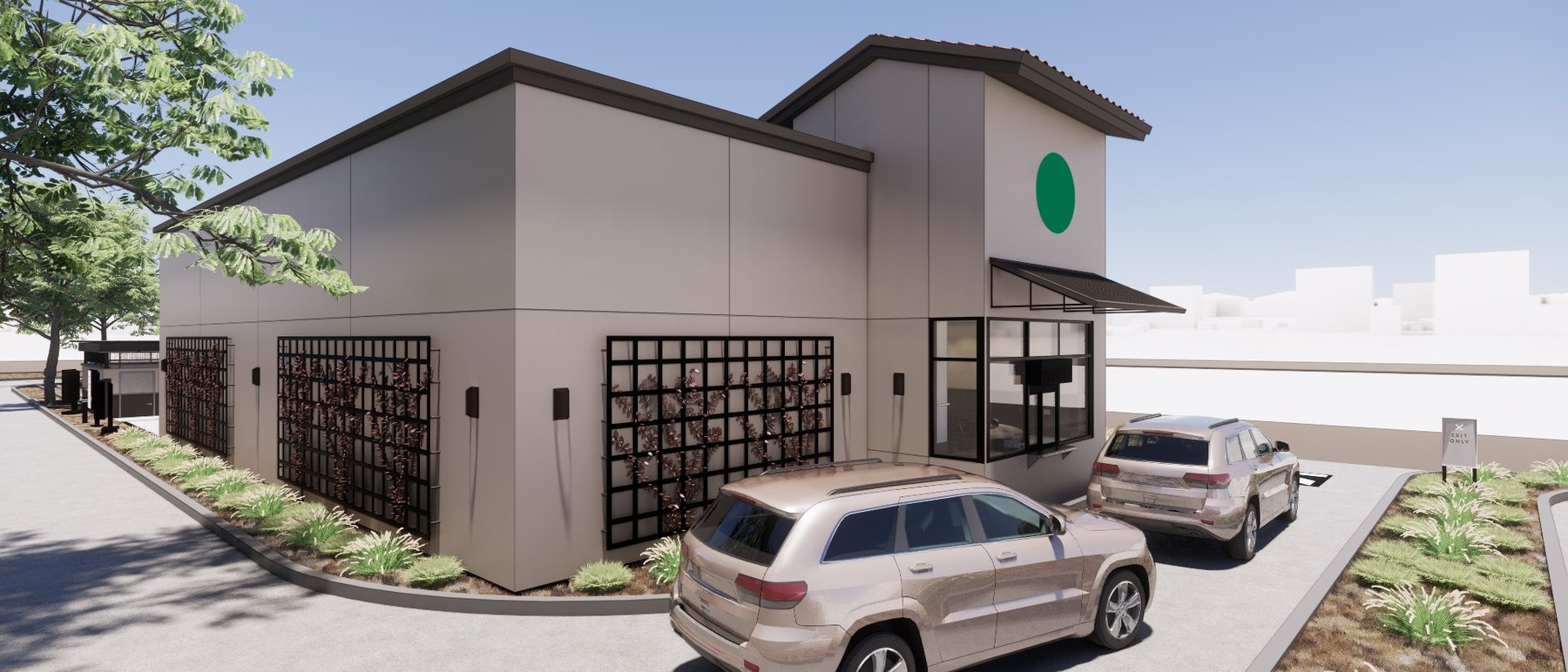 Drive-thru lane curving along a coffee pad with a stone tower, awning and landscaped edges